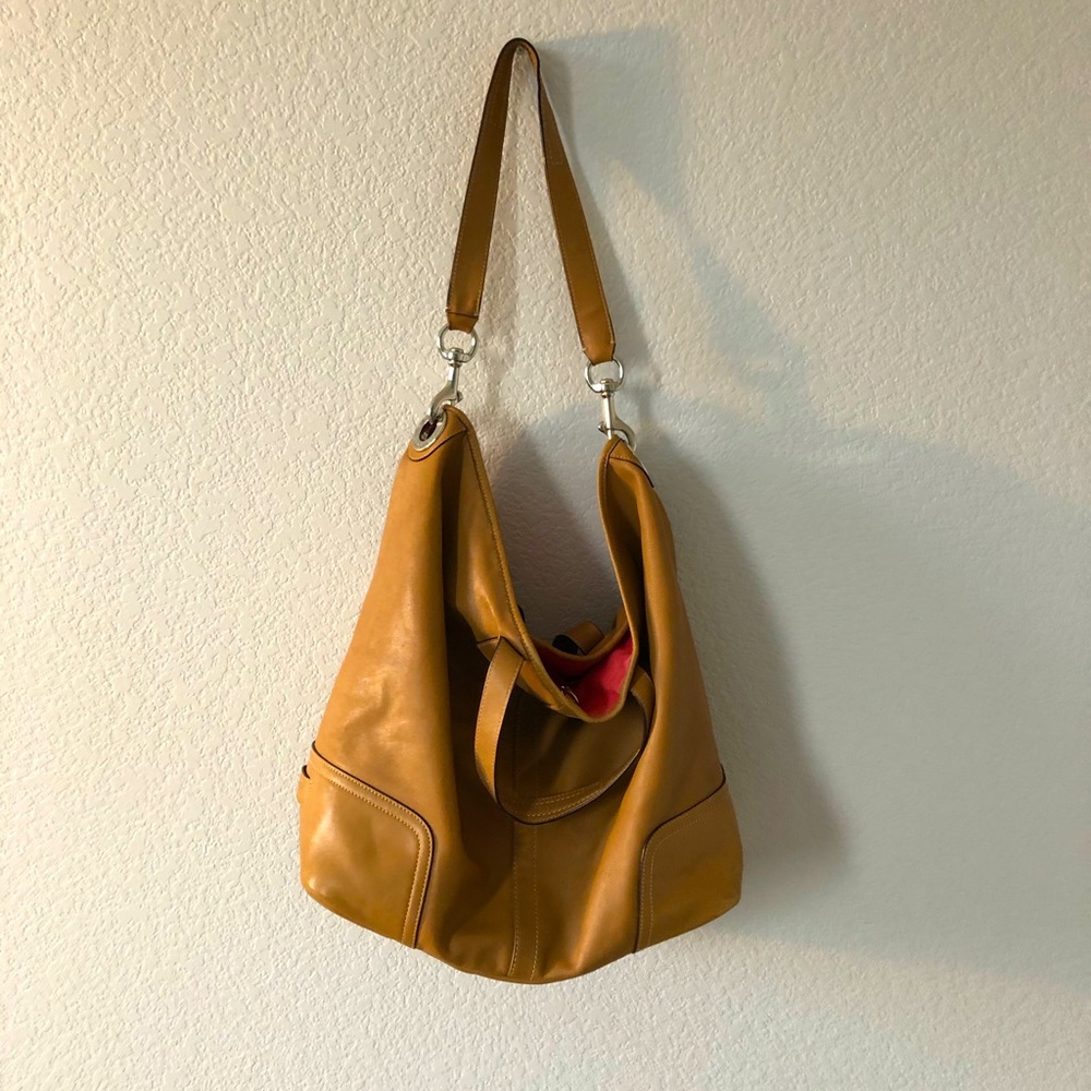 Light brown and pink Coach purse